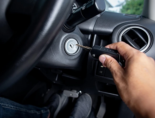 Close-up of a broken key lodged in a vehicle ignition, showing the need for broken key extraction.